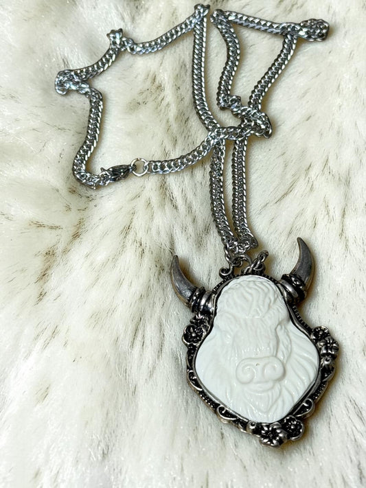 Bull horn background necklace